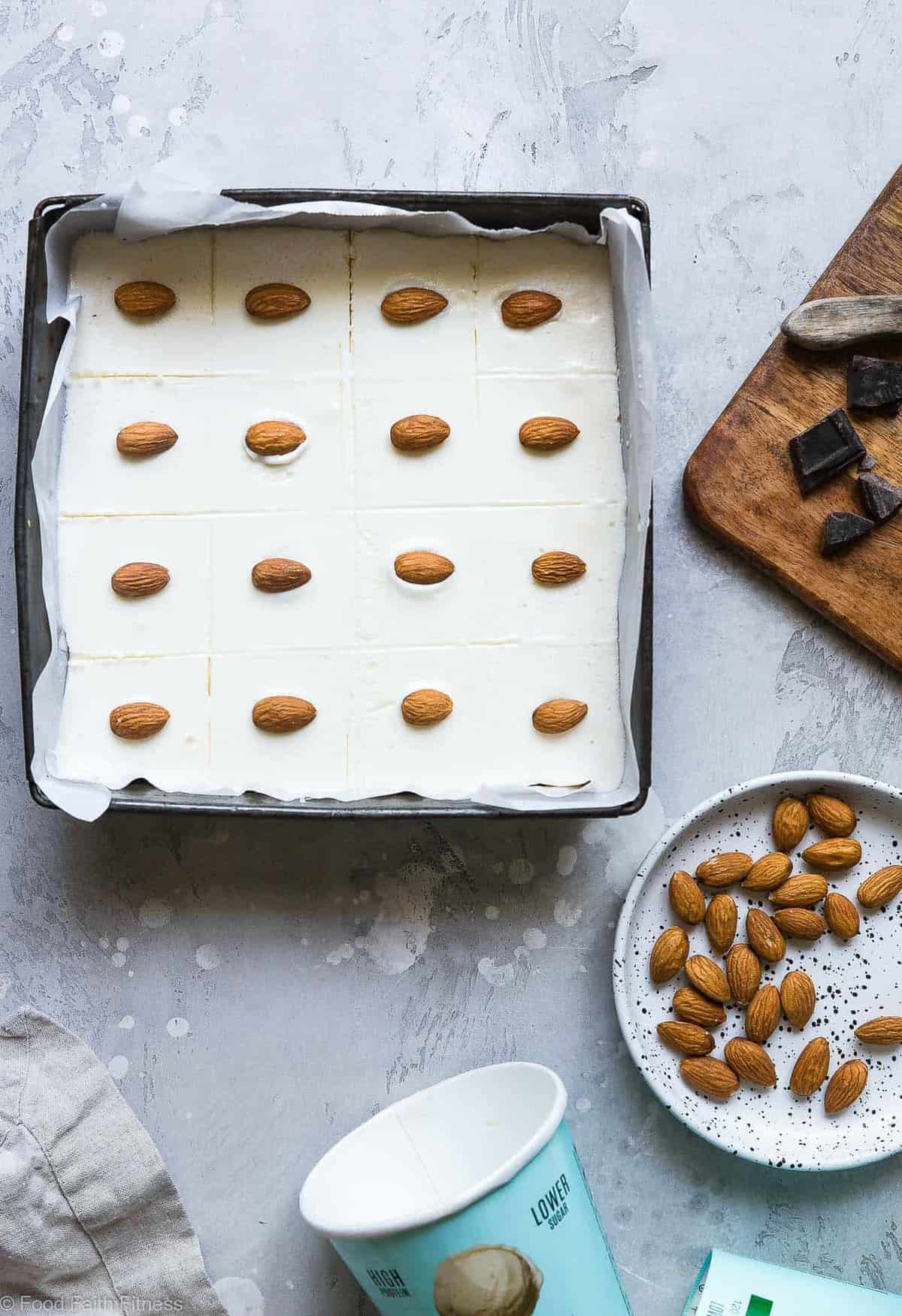 Healthy Almond Joy Ice Cream Bars - These easy, 5 ingredient Almond Joy Ice Cream Bars are a healthier, protein packed Summer dessert that is gluten free and only 116 calories! Kids and adults are going to LOVE these! | #Foodfaithfitness | #Glutenfree #Healthy #NoBake #Chocolate #Dessert Healthy Almond Joy Ice Cream Bars - These easy, 5 ingredient Almond Joy Ice Cream Bars are a healthier, protein packed Summer dessert that is gluten free and only 116 calories! Kids and adults are going to LOVE these! | #Foodfaithfitness | #Glutenfree #Healthy #NoBake #Chocolate #Dessert
