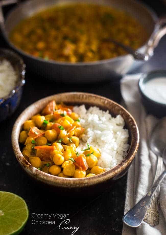 Vegan Chickpea Curry - A gluten free, 20-minute, weeknight dinner that's made extra creamy with coconut milk! It's perfect for a cozy, Meatless Monday meal! | Foodfaithfitness.com | @FoodFaithFit