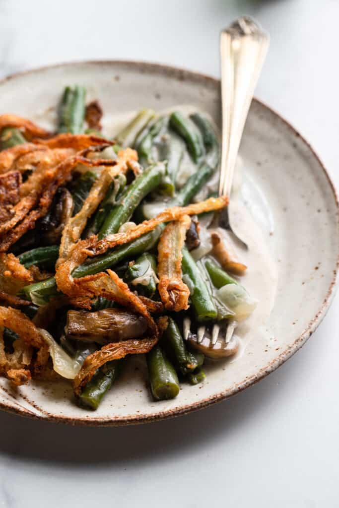 a small plate with Dairy Free Vegan Green Bean and a fork