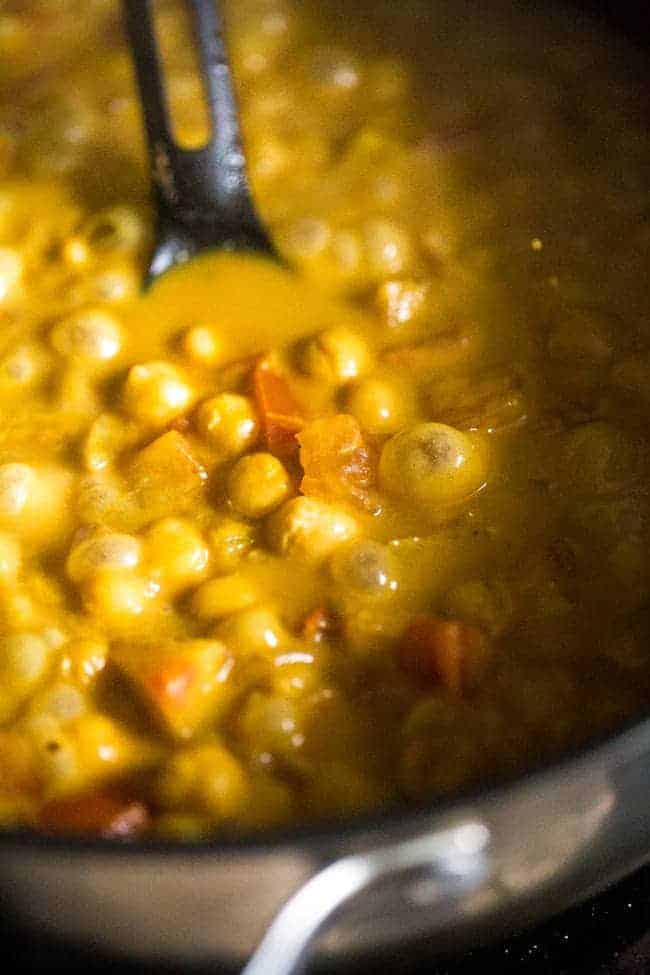 Vegan Chickpea Curry - A gluten free, 20-minute, weeknight dinner that's made extra creamy with coconut milk! It's perfect for a cozy, Meatless Monday meal! | Foodfaithfitness.com | @FoodFaithFit