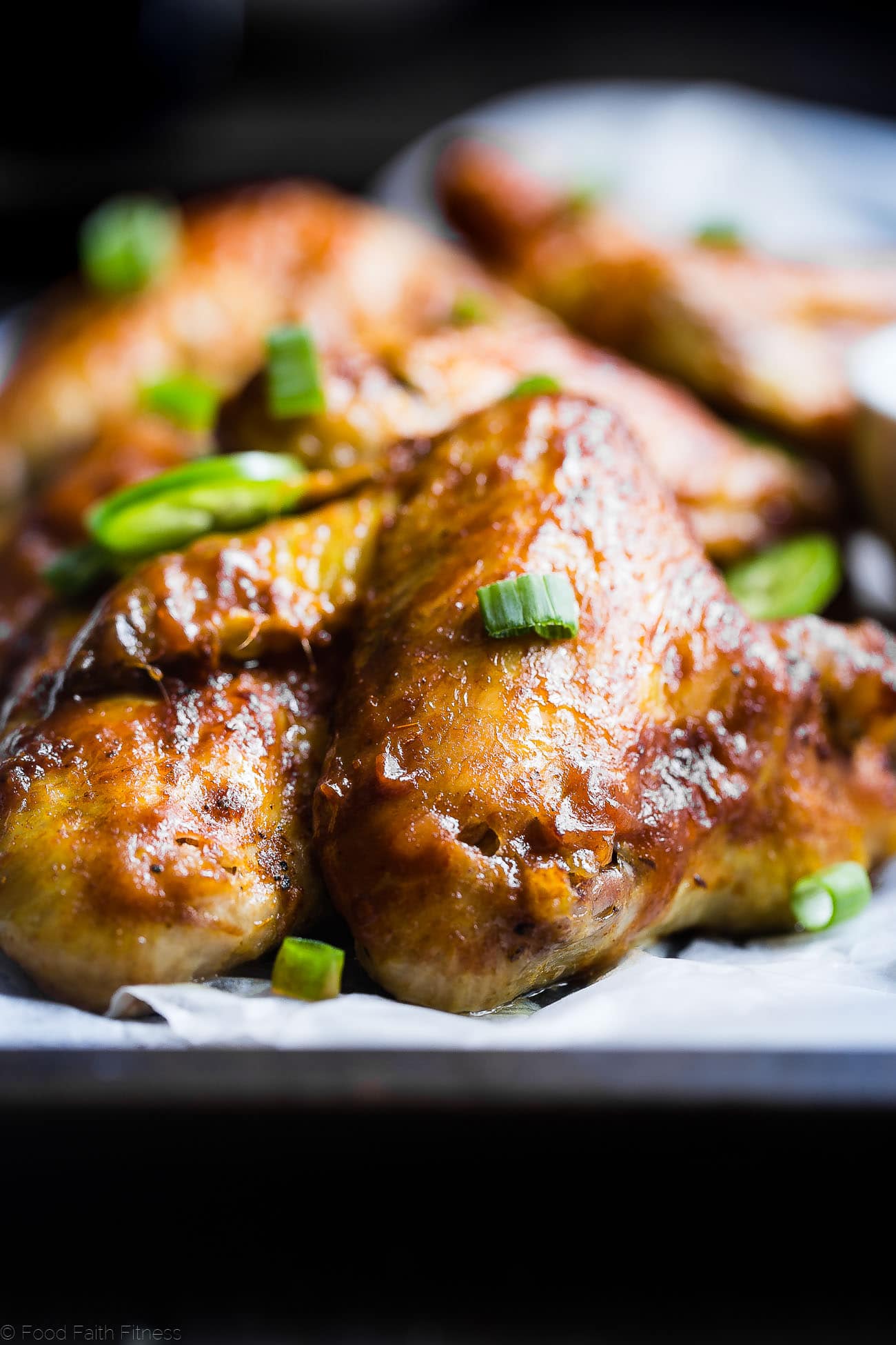 Slow Cooker BBQ Chicken Wings - Let the slow cooker do the work for you with these easy paleo-friendly chicken wings! A healthy, gluten, grain and dairy free, crowd pleasing appetizer for game day! | Foodfaithfitness.com | @FoodFaithFit