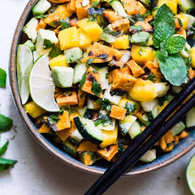 Thai Mango Avocado Salad with Grilled Sweet Potatoes - Loaded with sweet mango, tangy lime juice and creamy avocado, this is an EASY, healthy summer side that is sure to please! Gluten free, vegan, paleo and whole30 friendly too! | #Foodfaithfitness | #Whole30 #Glutenfree #Vegan #Paleo #Dairyfree