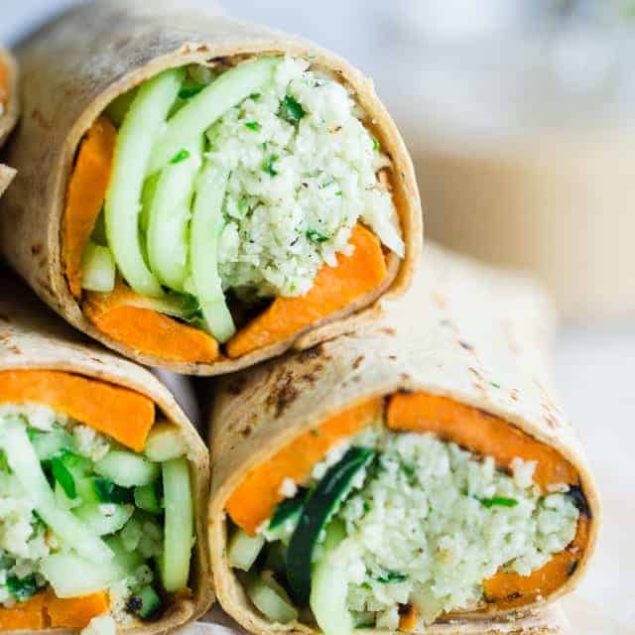 Vegan Grilled Sweet Potato and Mint Tahini Cauliflower Rice Wraps - Grilled sweet potatoes, mint tahini cauliflower rice and spiralized cucumber noodles make this easy, healthy and portable meatless meal! | Foodfaithfitness.com | @FoodFaithFit